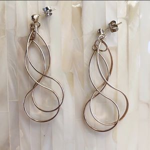 Silver swirl hoop earrings. Never worn!